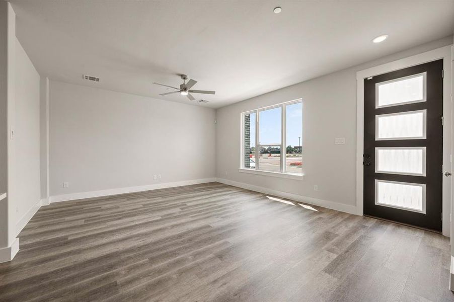 This spacious, light filled family room is the perfect place to host friends and family!