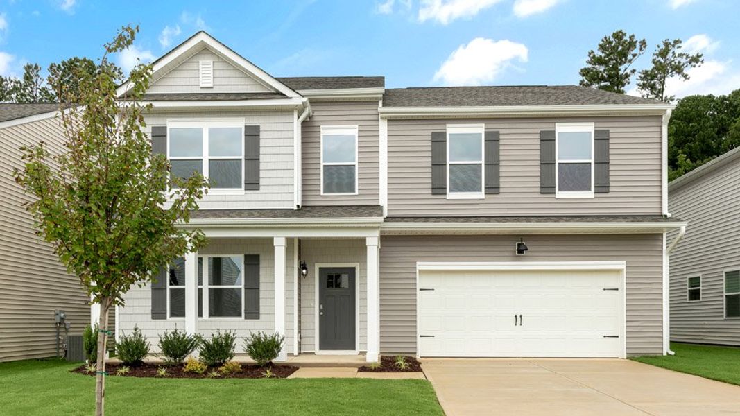 Representative exterior photo of a completed home built from the COLUMBIA by D.R. Horton in Galvins Ridge, Sanford, NC (Image 15).