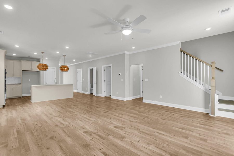 Spacious, unfurnished interior of a new home in Tidewater at Lakes of Cane Bay, Summerville (Image 32).