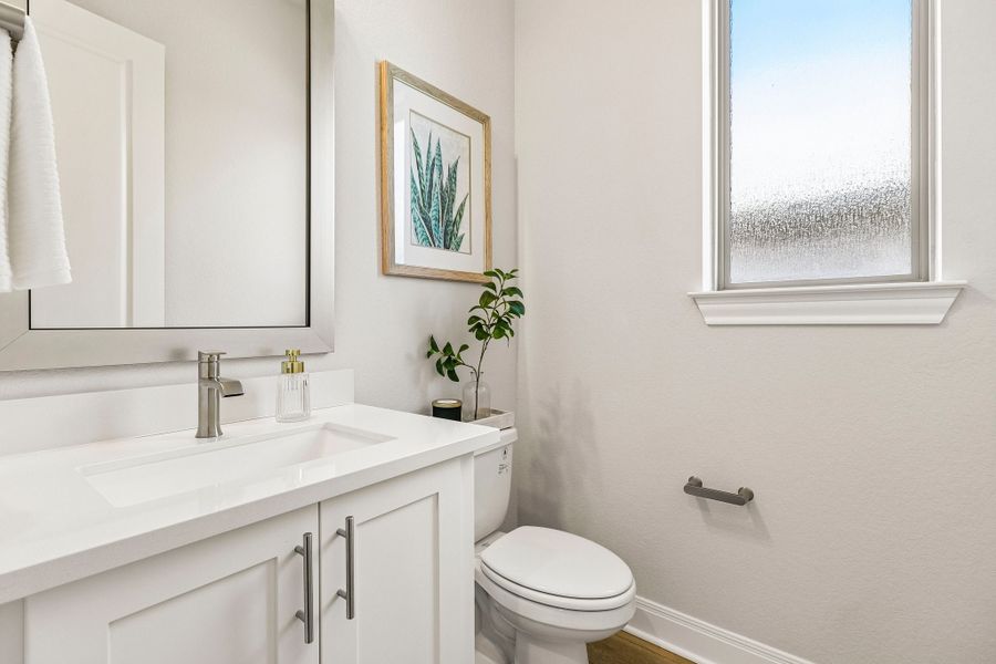 Representative furnished interior of a home built from the Hamilton by Risewell Homes in 6 Creeks, Kyle (Image 12).