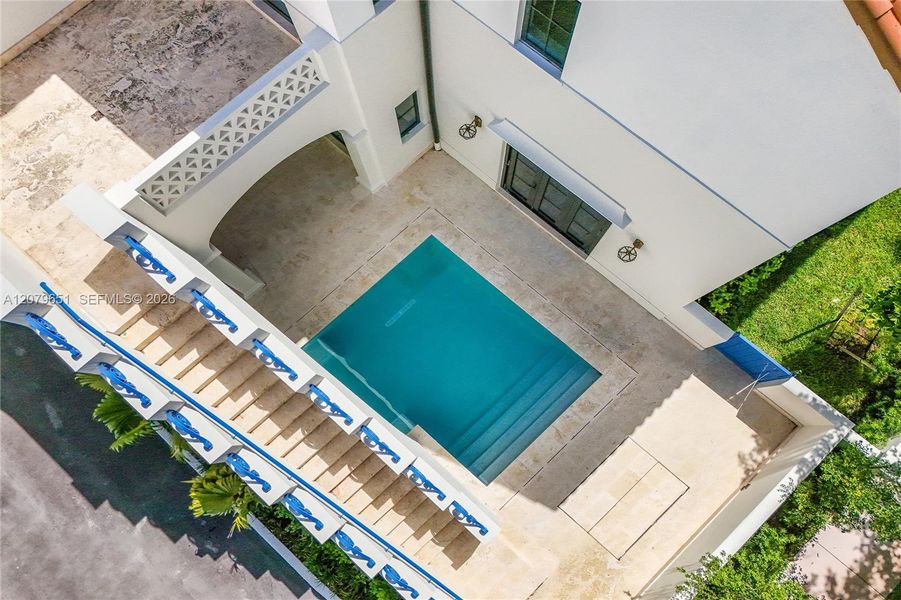 Exterior details and patio area of a home in , Coral Gables (Image 24).