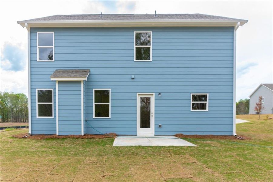 Front exterior of a new home in , Jefferson, GA, highlighting curb appeal (Image 15).