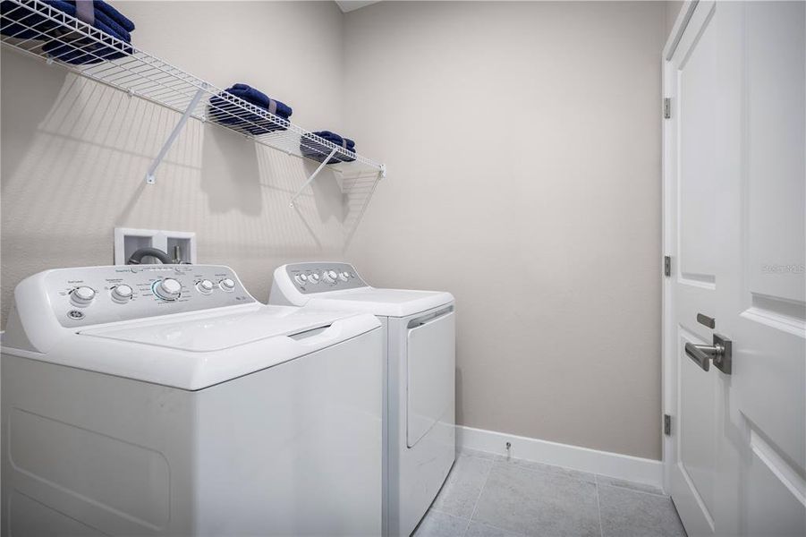 Furnished interior view inside a new home in The Palms at Venetian Bay, New Smyrna Beach (Image 6).
