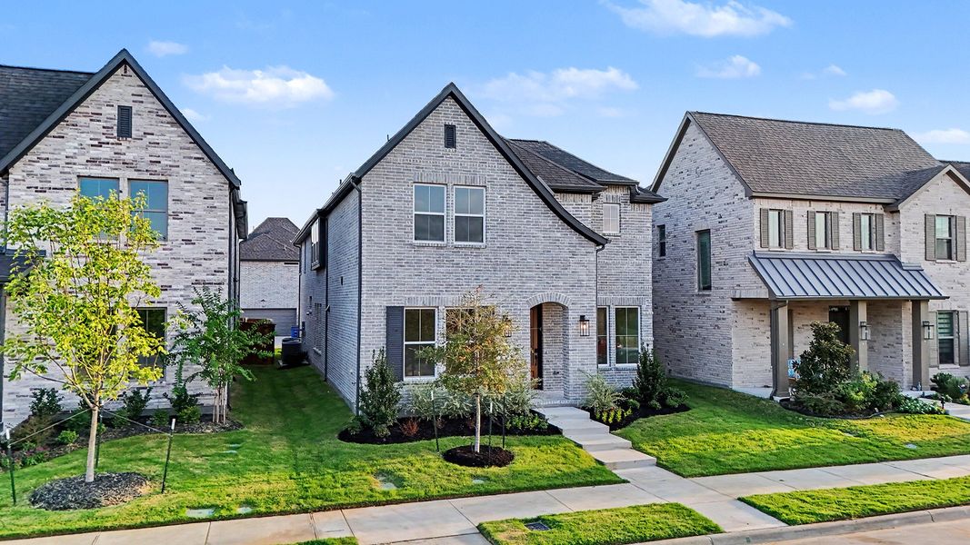 Front exterior of a new home in Light Farms Brenham - 40' Lots, Celina, TX, highlighting curb appeal (Image 19).