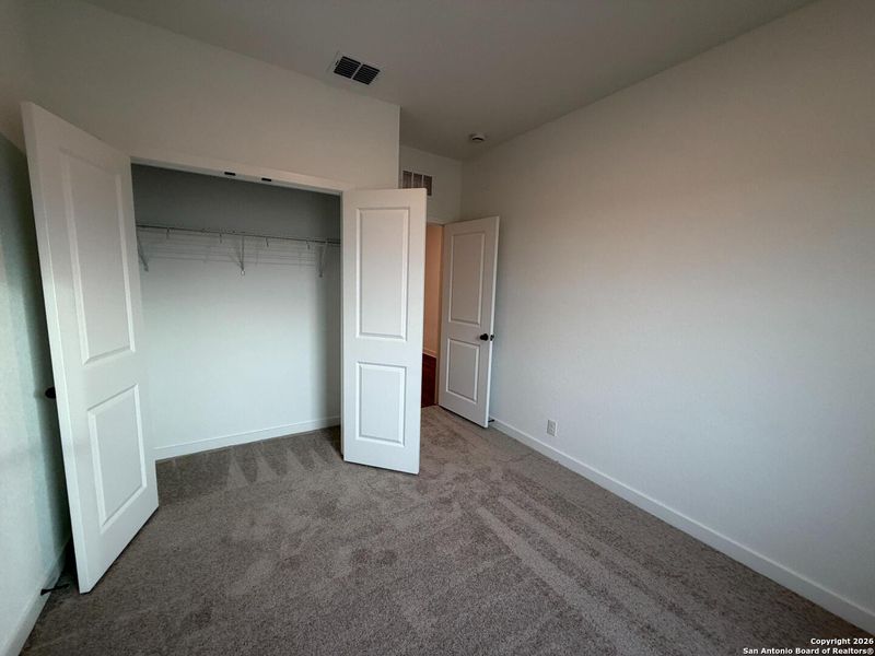 Spacious, unfurnished interior of a new home in The Preserve at the Wilder, Adkins (Image 17).