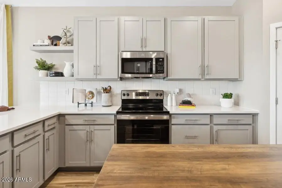 03_23447Wraymondst_2004_Small