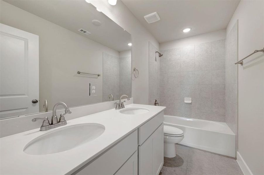 Furnished interior view inside a new home in Lily Creek at Sutton Fields, Aubrey (Image 12).