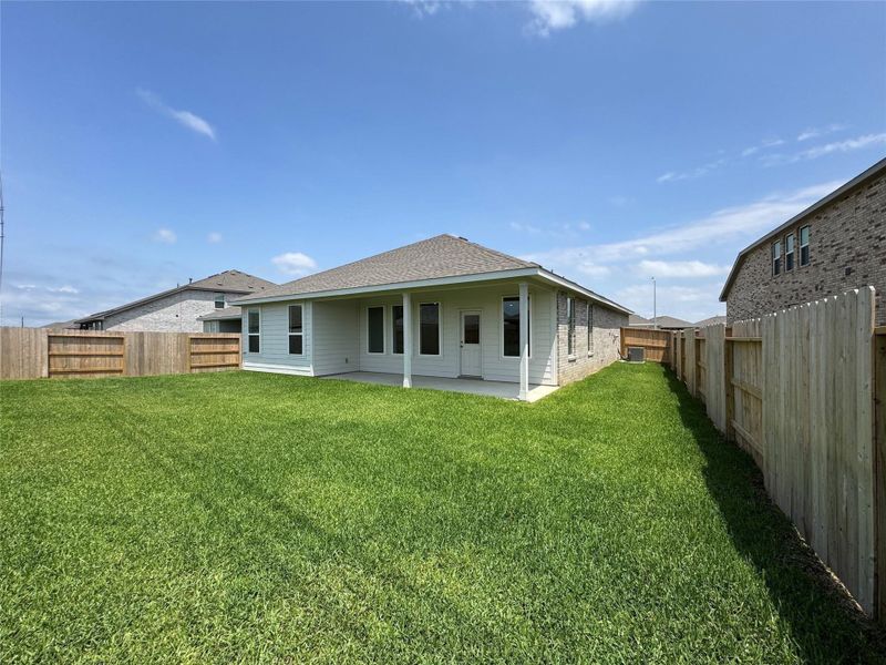 Exterior details and patio area of a home in Anniston, Katy (Image 24).