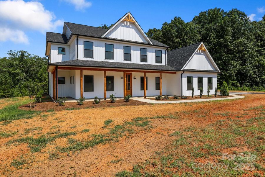 Front exterior of a new home in , China Grove, NC, highlighting curb appeal (Image 17).