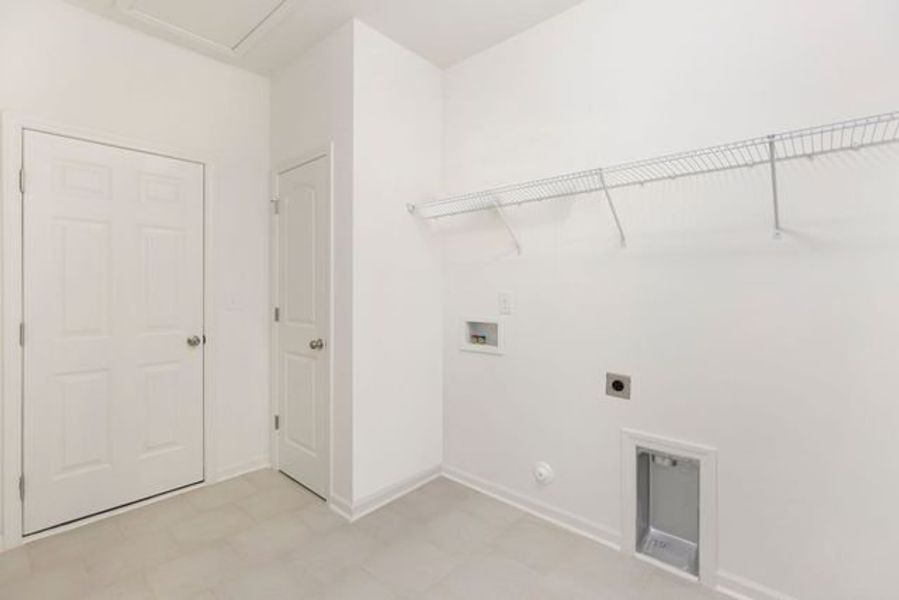 Representative unfurnished interior of a home built from the Ryker by True Homes in Autumn Ridge, High Shoals (Image 19).