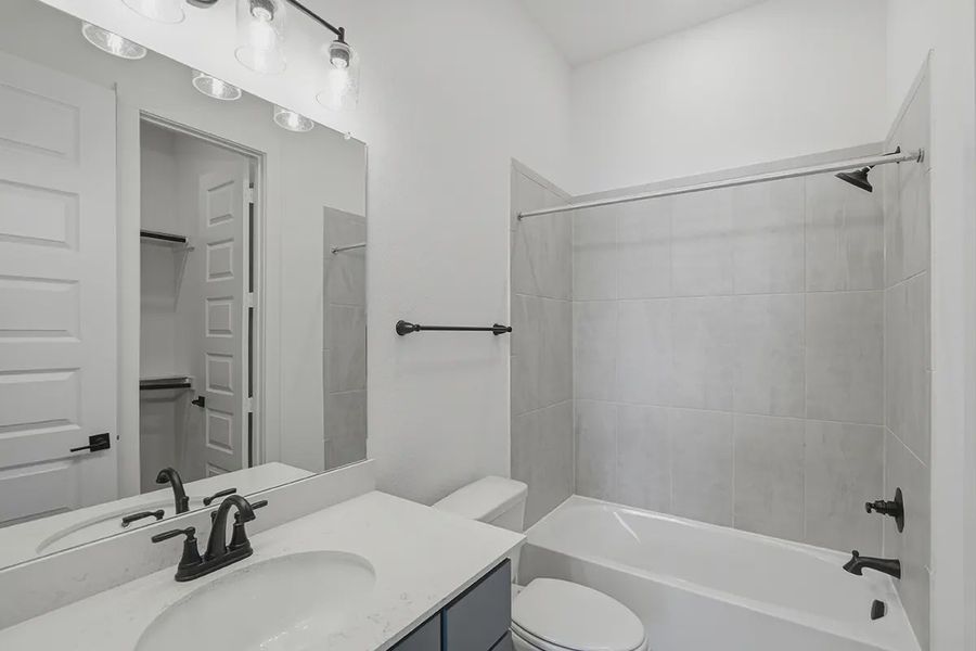 Representative furnished interior of a home built from the Kingston by Chesmar Homes in Prominence 60's, San Antonio (Image 7).