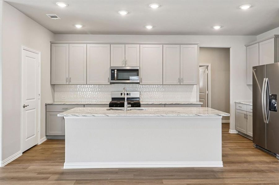 Photo is not of the actual home, but is an inspirational photo of builder’s model home and may depict options, furnishings, and/or decorator features that are not included.