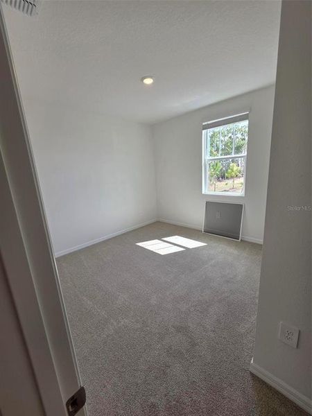 Spacious, unfurnished interior of a new home in Magnolia Bay - Classic Series, Nokomis (Image 15).