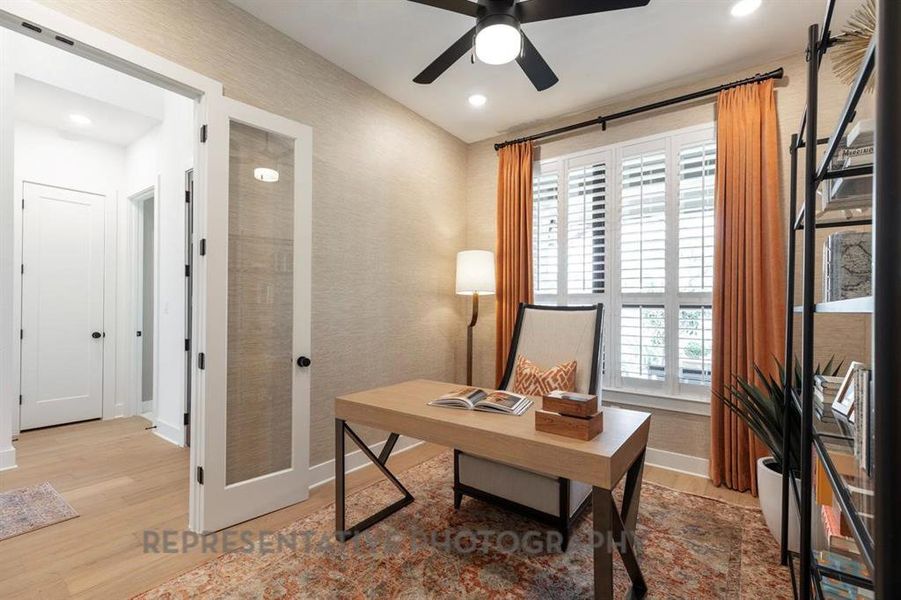 Home office featuring light wood-type flooring, a ceiling fan, and recessed lighting Home office featuring light wood-type flooring, a ceiling fan, and recessed lighting