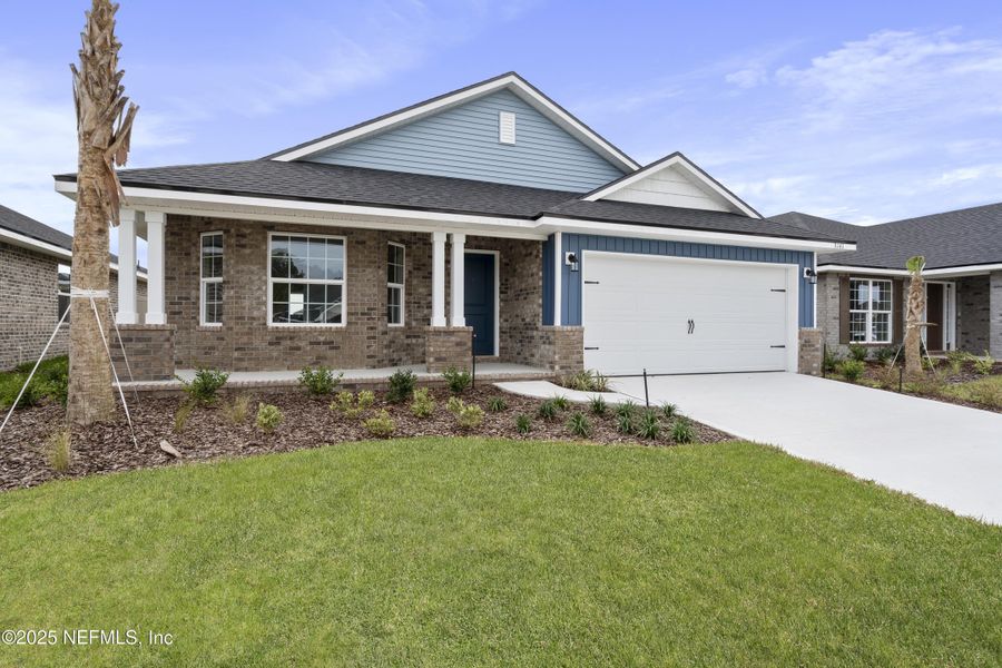 Front exterior of a new home in Shadow Crest at Rolling Hills, Green Cove Springs, FL, highlighting curb appeal (Image 16). Front exterior of a new home in Shadow Crest at Rolling Hills, Green Cove Springs, FL, highlighting curb appeal (Image 16).