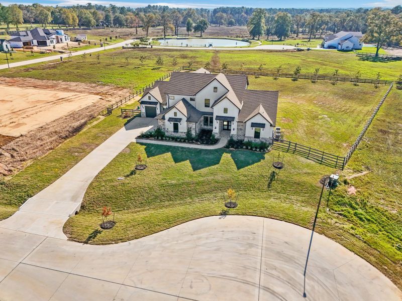 Front exterior of a new home in Bentwood Farms, Montgomery, TX, highlighting curb appeal (Image 31).