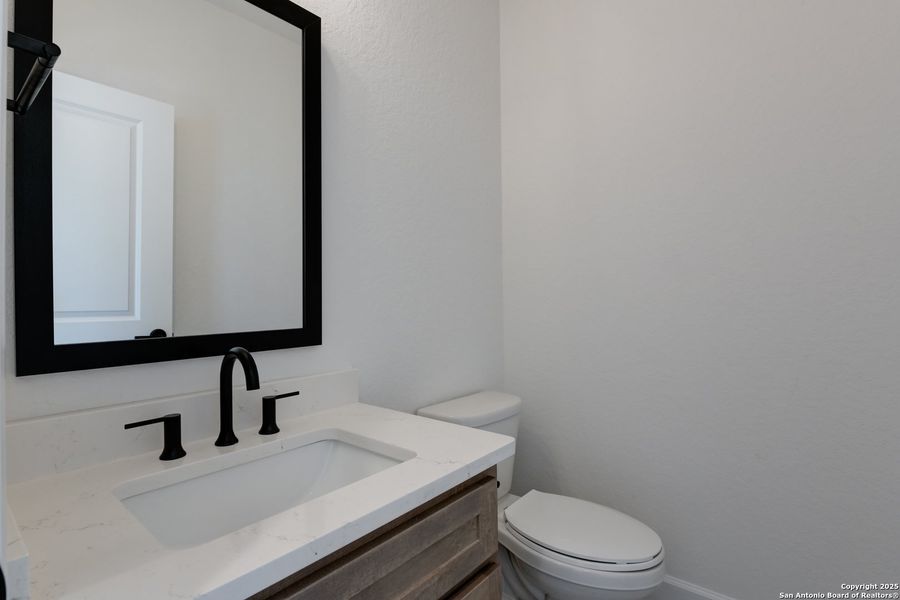 Furnished interior view inside a new home in Megan's Landing 70's, Castroville (Image 9).