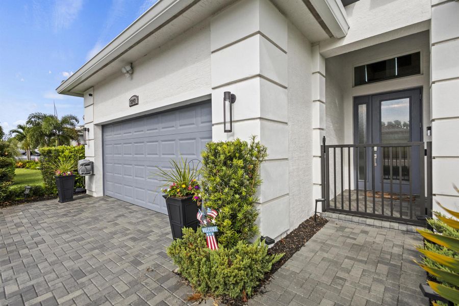 Front exterior of a new home in , Port St. Lucie, FL, highlighting curb appeal (Image 23).
