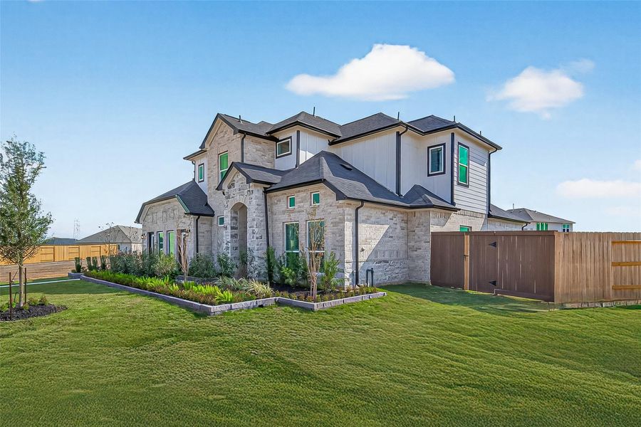 Front exterior of a new home in Rates starting as low as, Iowa Colony, TX, highlighting curb appeal (Image 23).