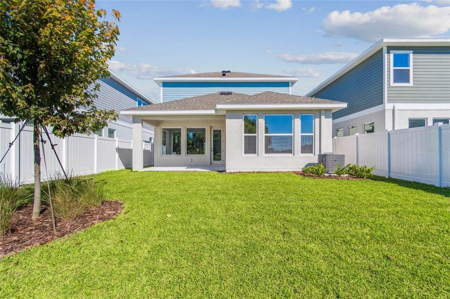Exterior details and patio area of a home in Persimmon Park - Garden Series, Wesley Chapel (Image 30).