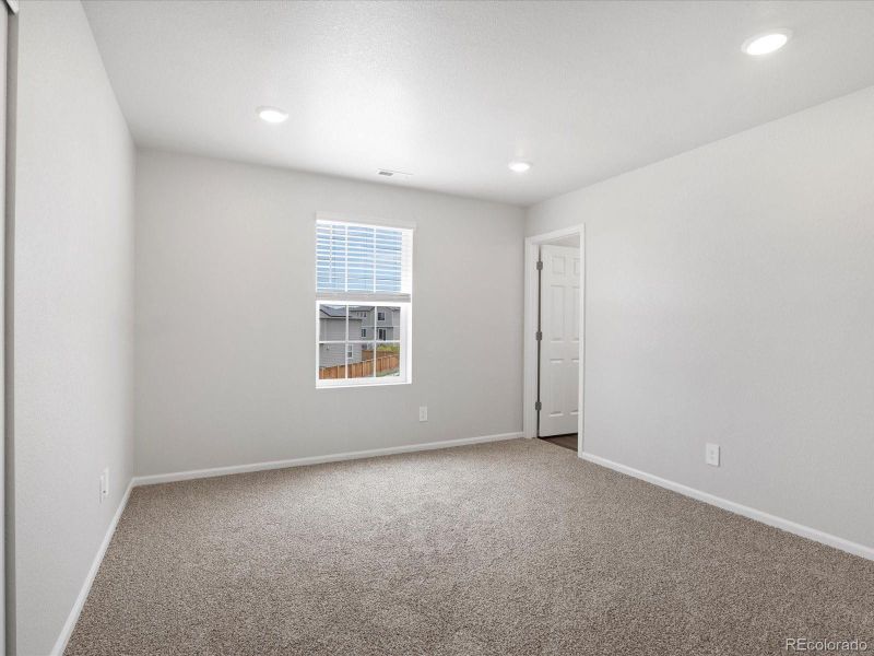 Spacious, unfurnished interior of a new home in Buffalo Highlands: The Canyon Collection, Commerce City (Image 33).