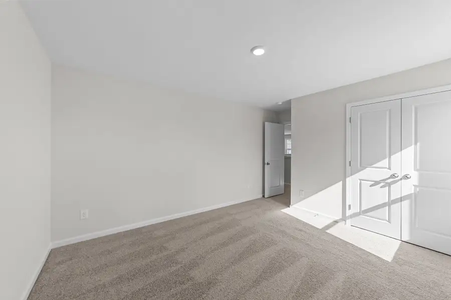 Spacious, unfurnished interior of a new home in Neill's Pointe, Angier (Image 33).