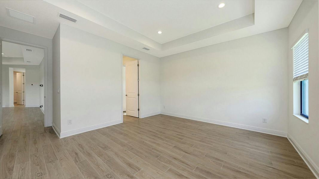 Spacious, unfurnished interior of a new home in Palm Grove Real Estate and Homes for Sale in Lakewood Ranch, FL - Neal Communities, Lakewood Ranch (Image 51).