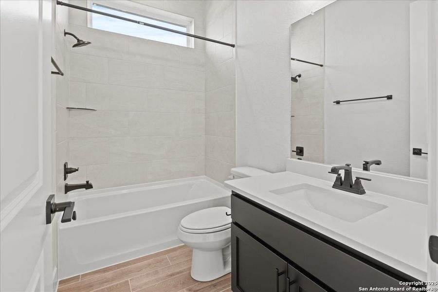 Furnished interior view inside a new home in Village at Three Oaks, Seguin (Image 8).