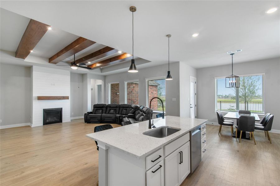 Cozy living area featuring a charming fireplace.
