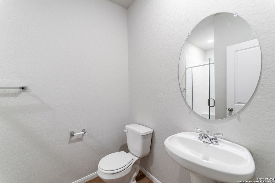 Furnished interior view inside a new home in Hennersby Hollow, San Antonio (Image 8).