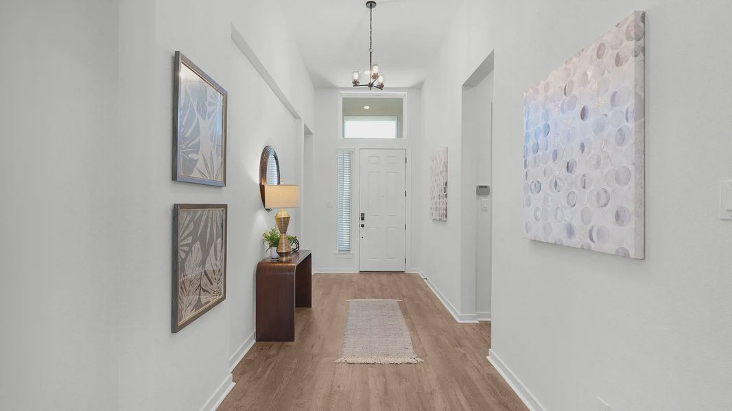 Representative furnished interior of a home built from the Brooks by Chesmar Homes in University Heights, Round Rock (Image 5).