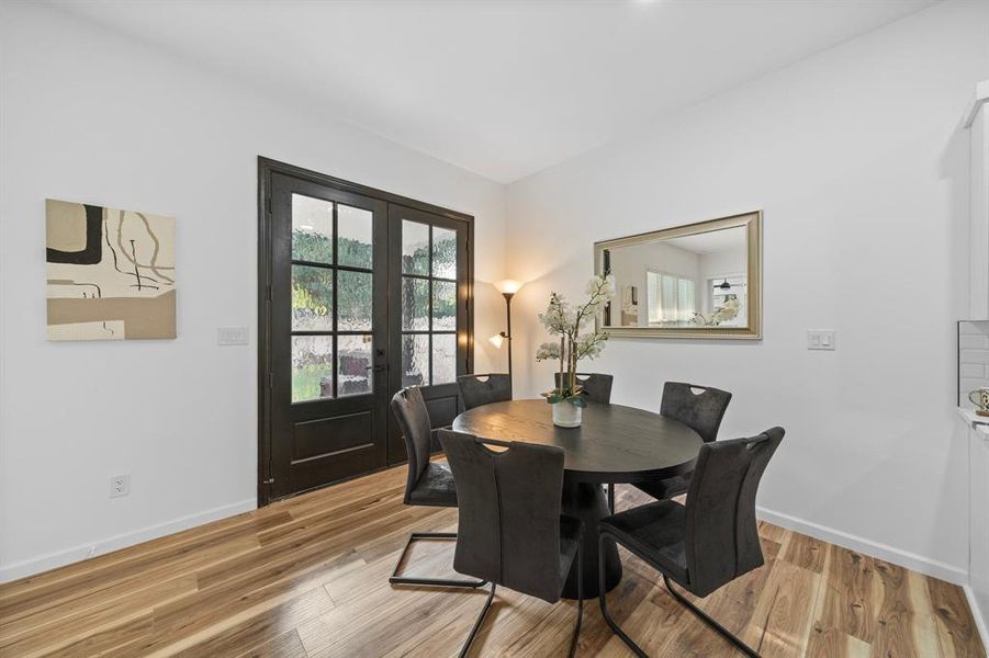 Dining space featuring light hardwood / wood-style floors