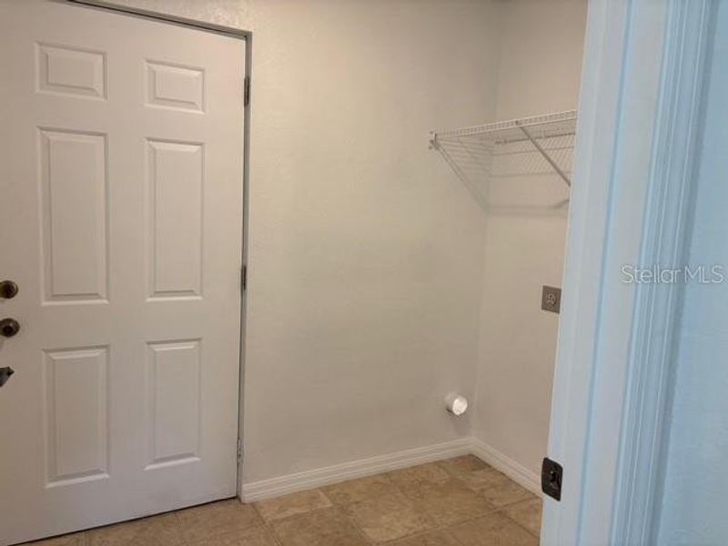 Laundry Room and Entrance to Backyard