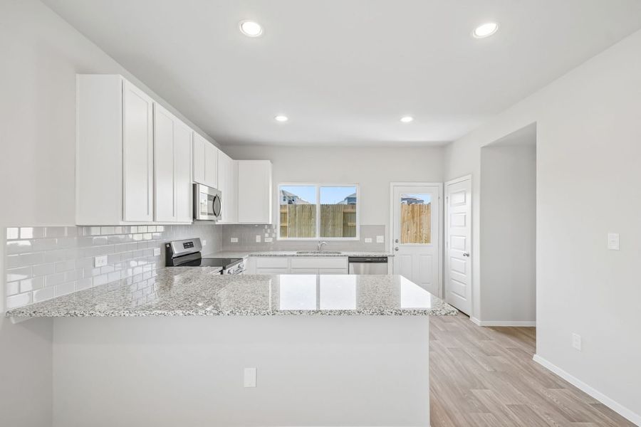 Furnished interior view inside a new home in Edgebrooke, Pflugerville (Image 6).
