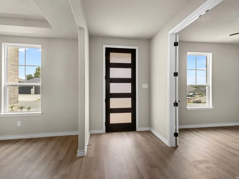Spacious, unfurnished interior of a new home in The Reserve at Potranco Oaks, Castroville (Image 23).