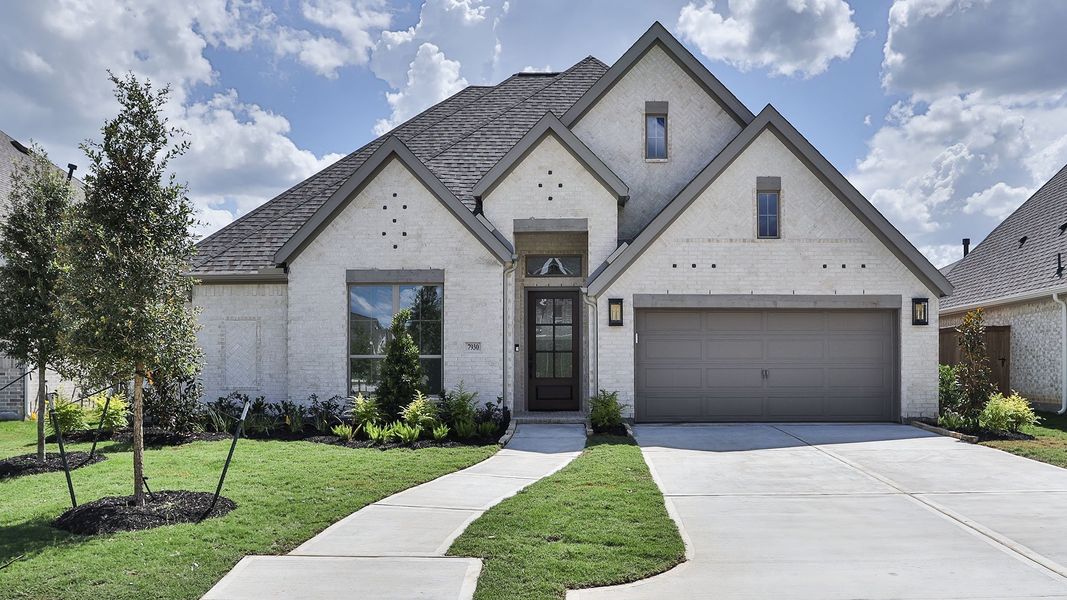 Front exterior of a new home in The Highlands, Porter, TX, highlighting curb appeal (Image 1). Front exterior of a new home in The Highlands, Porter, TX, highlighting curb appeal (Image 1).