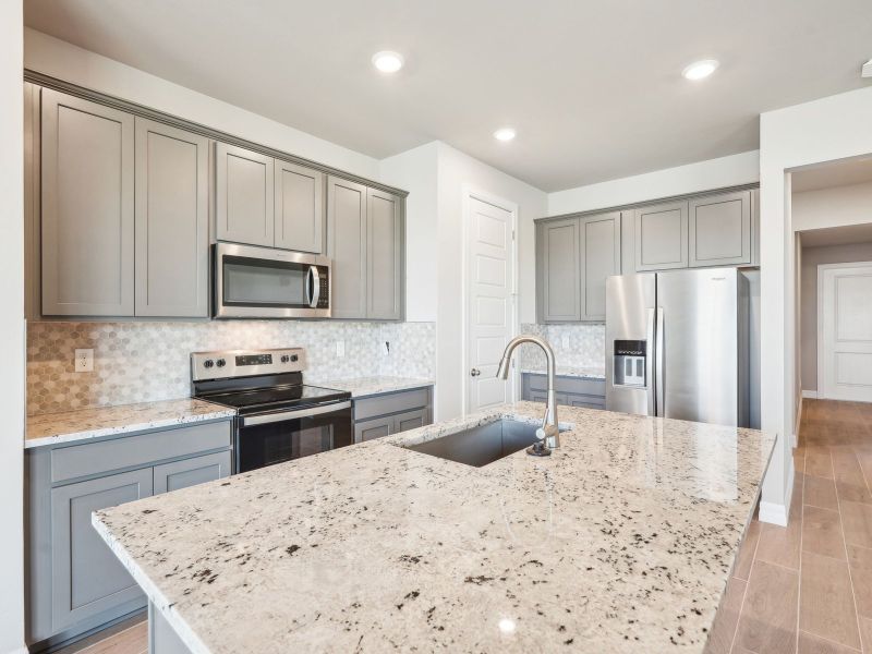 Furnished interior view inside a new home in Crescent Lakes - Reserve Series, Punta Gorda (Image 7).