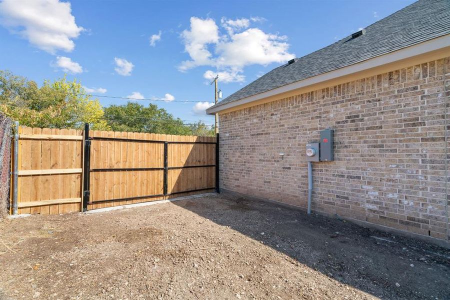 Exterior details and patio area of a home in , White Settlement (Image 31).