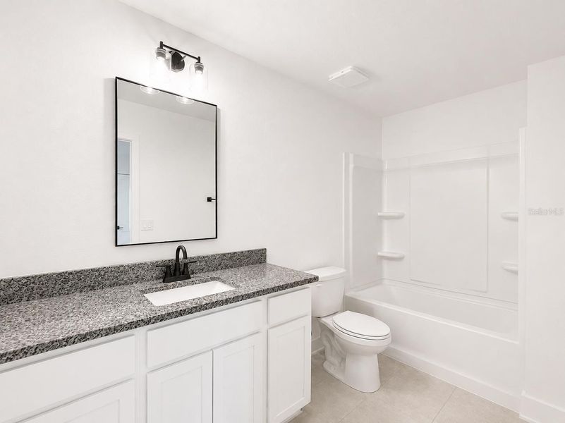 Furnished interior view inside a new home in Harmony Central, St. Cloud (Image 8).