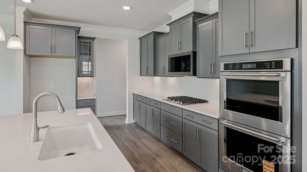Furnished interior view inside a new home in Sylvan Creek, Denver (Image 8).