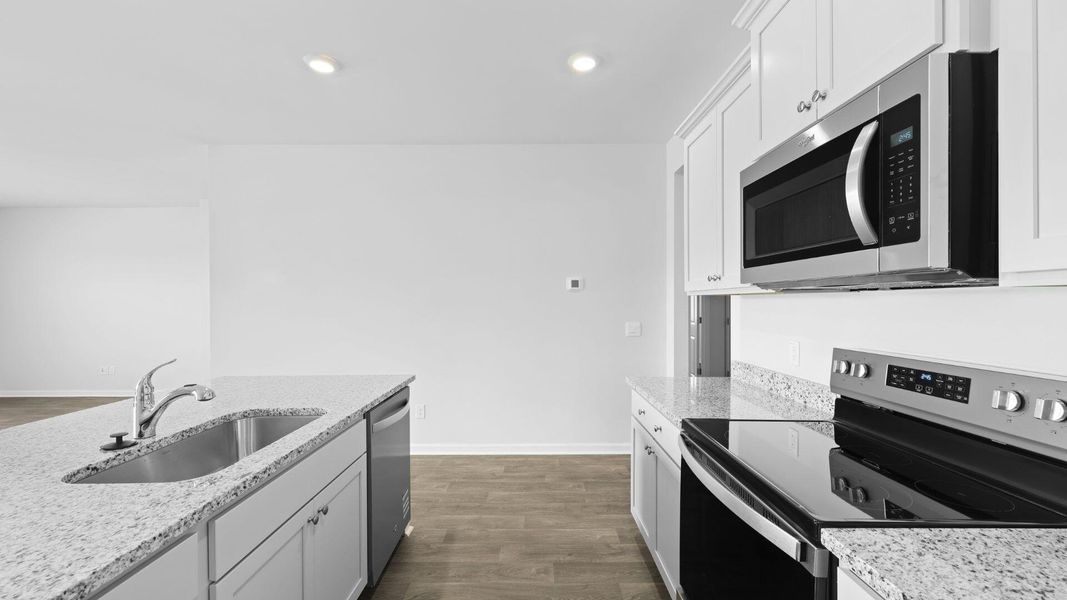 Furnished interior view inside a new home in The Ranch, Holly Hill (Image 8).