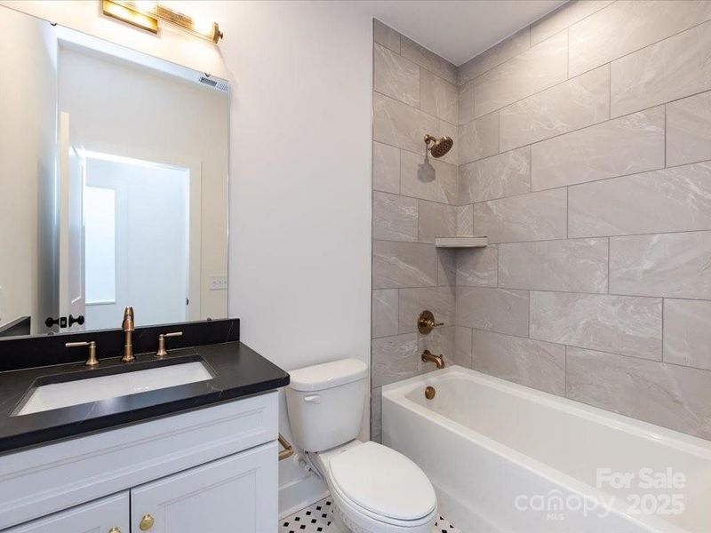 Secondary Bedroom with Tile Surround