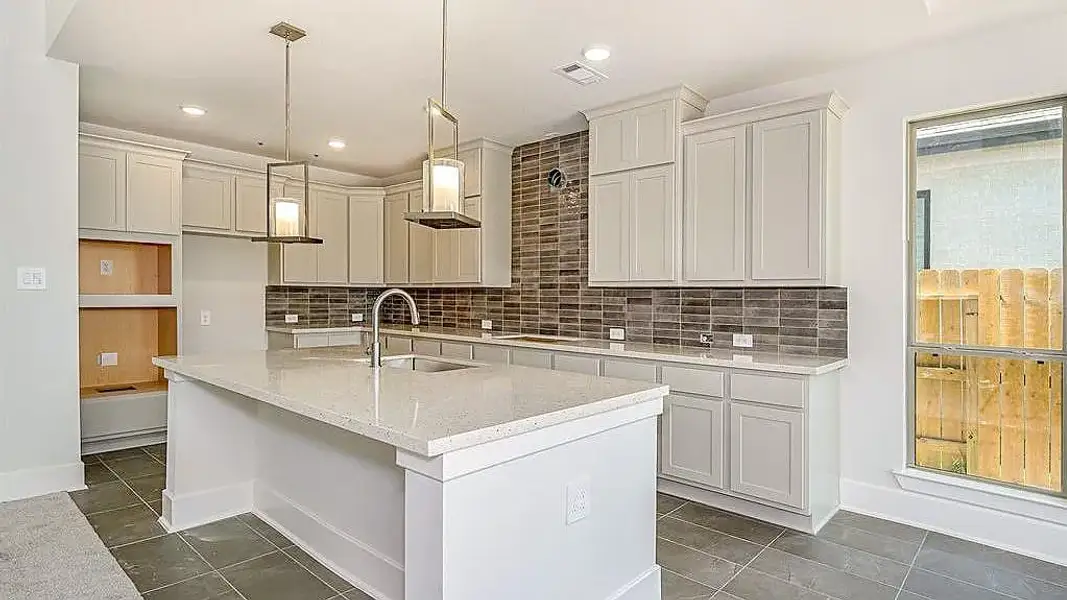 Furnished interior view inside a new home in Meridiana, Manvel (Image 9).
