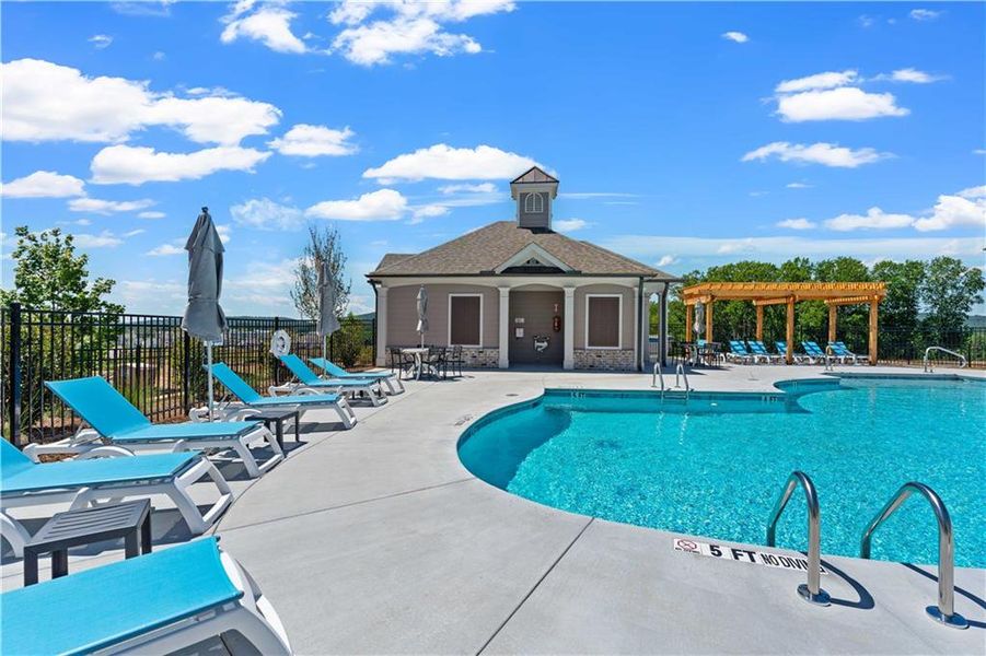Front exterior of a new home in Palisades Townhomes, Cumming, GA, highlighting curb appeal (Image 22).