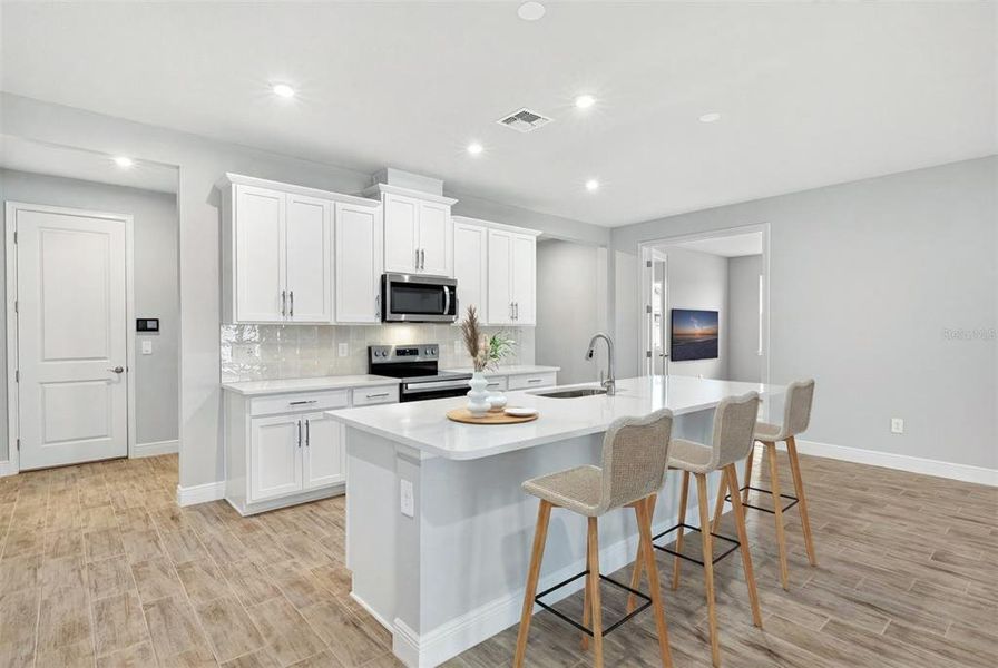 Furnished interior view inside a new home in Wellen Park, Venice (Image 8).