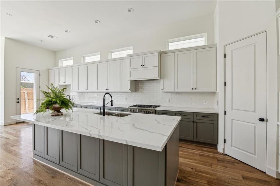 Quartz countertops. Storage under the island