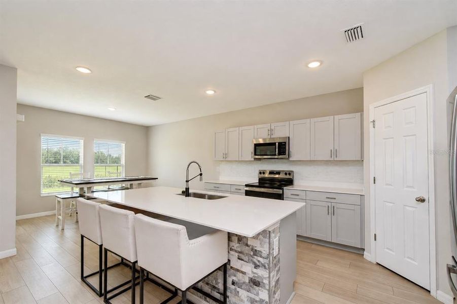 Furnished interior view inside a new home in Pasadena Point, Wesley Chapel (Image 5).