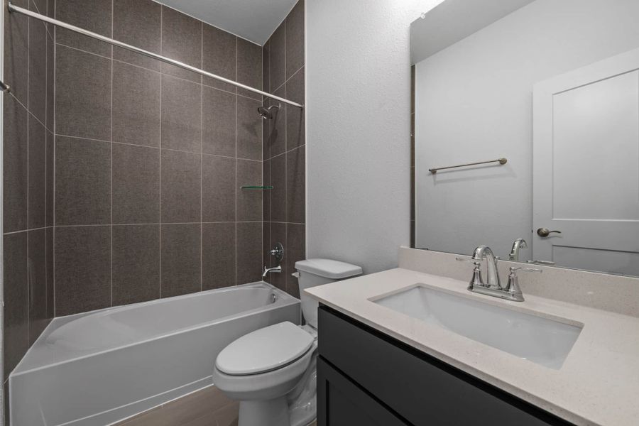 Furnished interior view inside a new home in Meridiana, Manvel (Image 7).