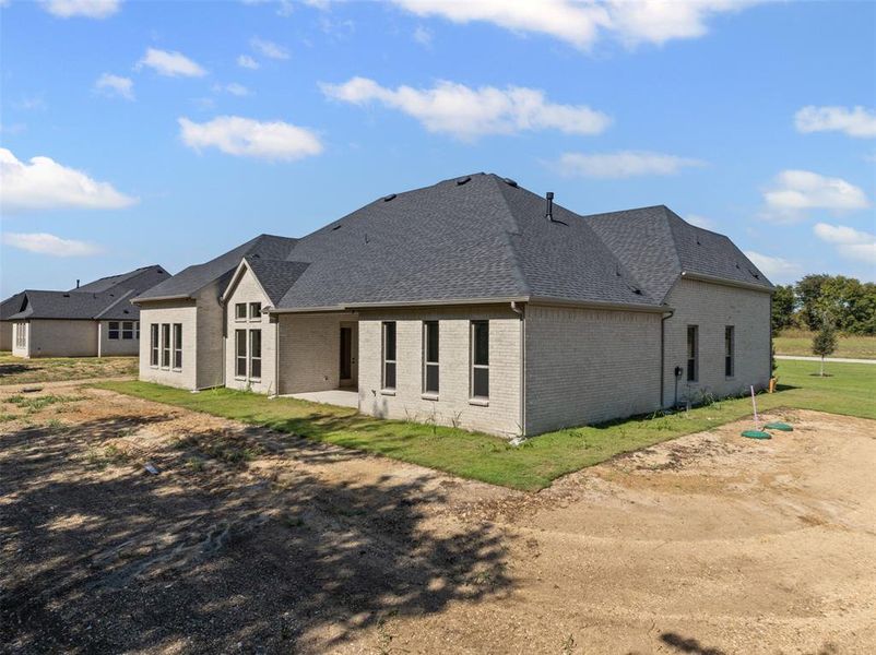 Exterior details and patio area of a home in Waterfall Ranch - 1 Acre Lots, Waxahachie (Image 3). Exterior details and patio area of a home in Waterfall Ranch - 1 Acre Lots, Waxahachie (Image 3).