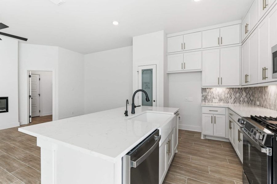 Furnished interior view inside a new home in Centero at Stone Oak, San Antonio (Image 9).